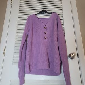Woman's purple sweater